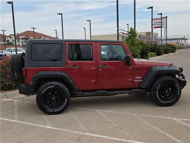 Used 2011 Red Jeep Sahara 4x4 image 5