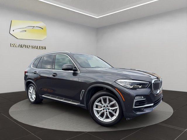 Used 2019 Dark Graphite Metallic BMW xDrive40i image 1