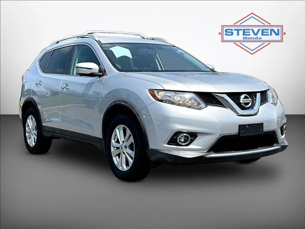 Used 2016 Brilliant Silver Nissan SV image 1