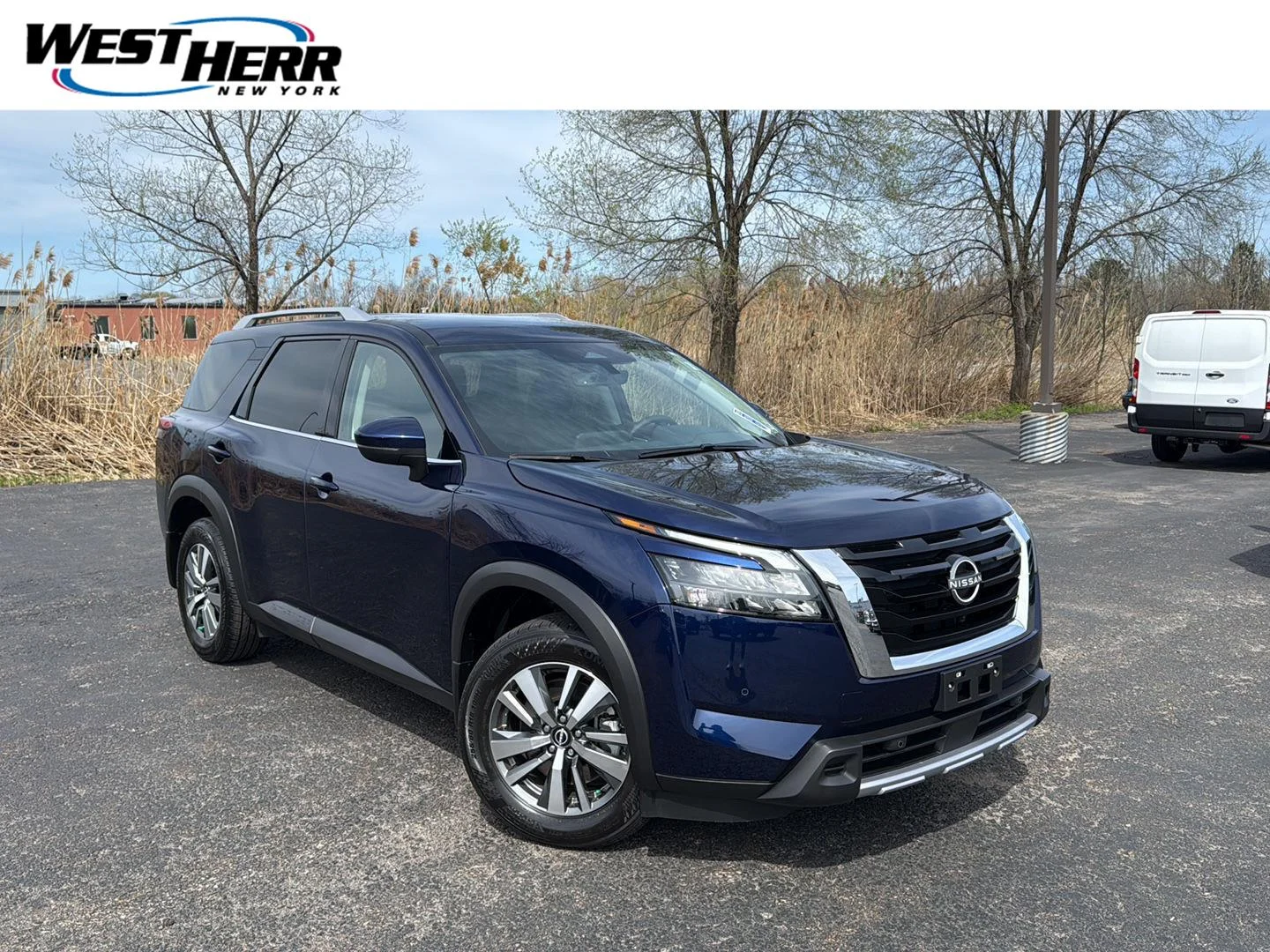 Used 2025 Deep Ocean Blue Pearl Nissan SL image 1