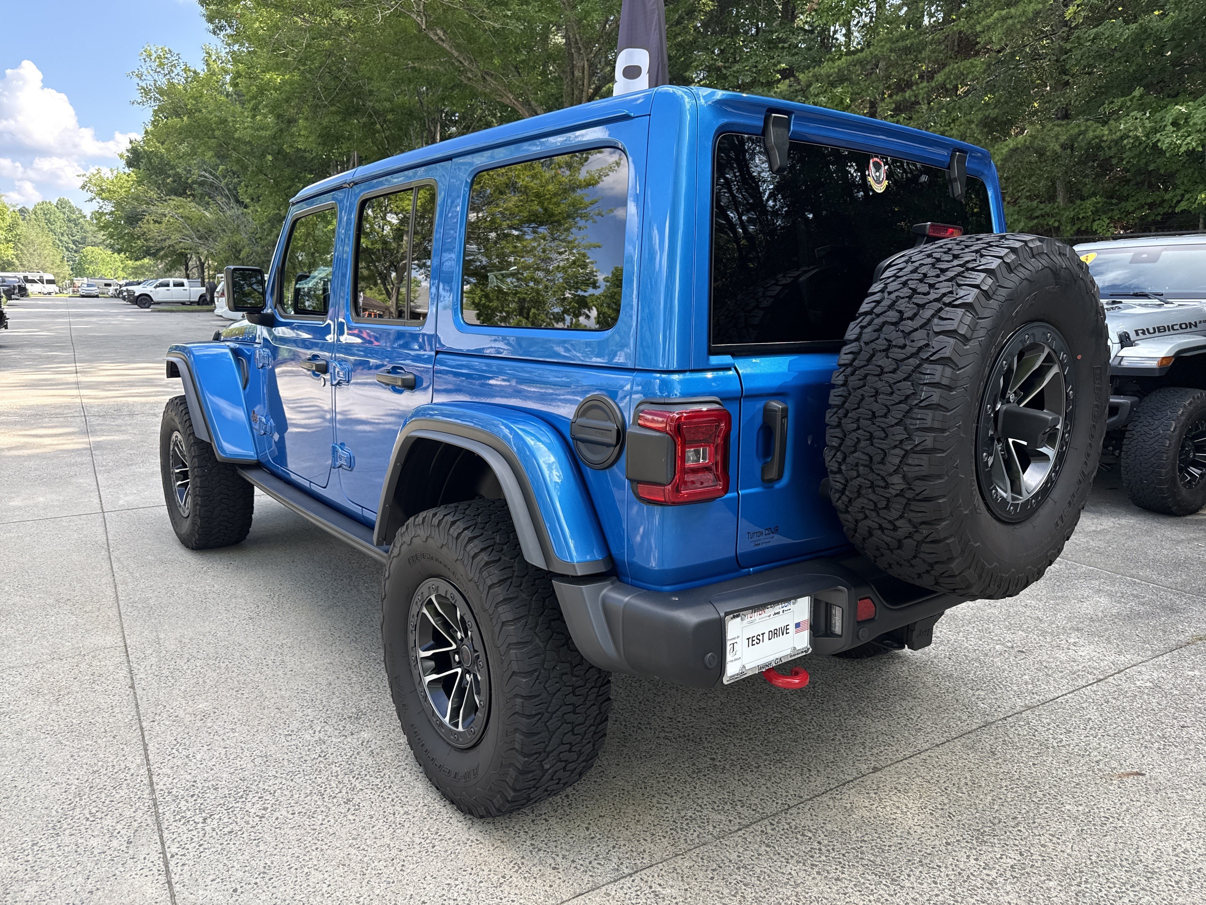 Used 2024 Hydro Blue Pearlcoat Jeep Rubicon X image 5