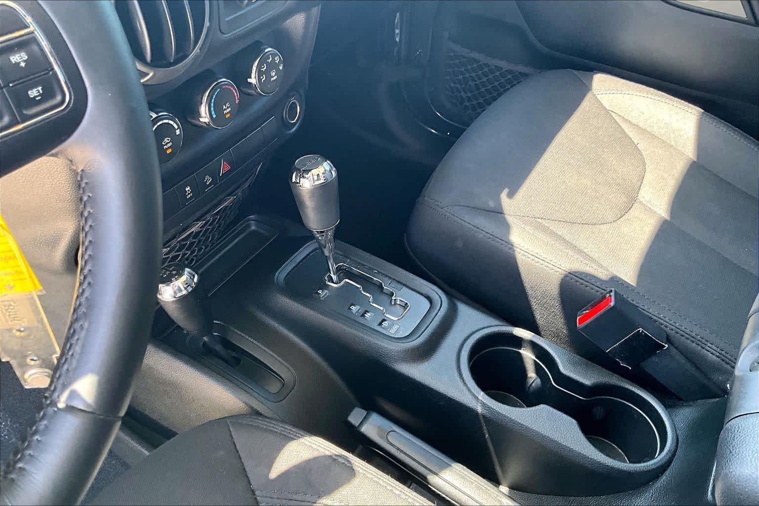 Used 2018 Granite Crystal Metallic Clearcoat Jeep Sport S image 14