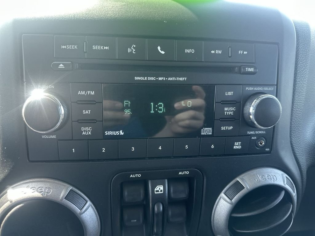 Used 2014 Black Jeep Unlimited Sport image 22