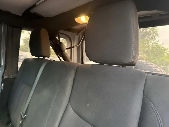 Used 2015 Gray Jeep Unlimited Sport image 17