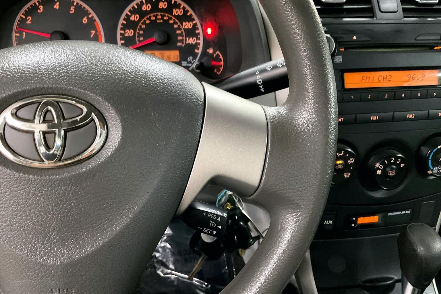Used 2010 Classic Silver Metallic Toyota LE image 23