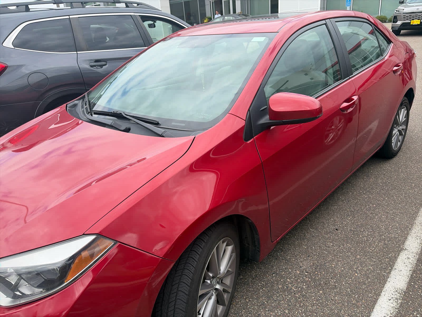 Used 2015 Barcelona Red Metallic Toyota LE Plus image 2