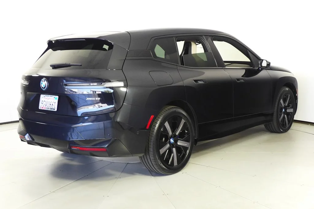 Used 2024 Black BMW xDrive50 image 6