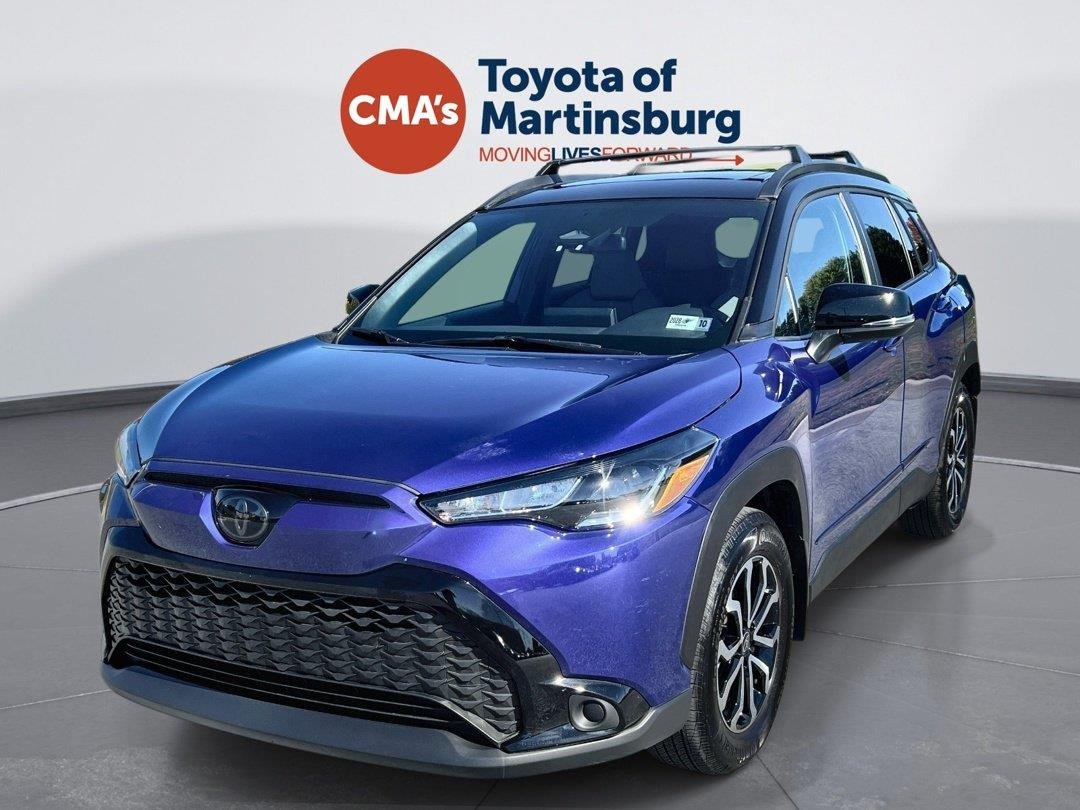 Used 2025 Blue Crush Metallic w/Jet Black Roof Toyota Hybrid SE image 1