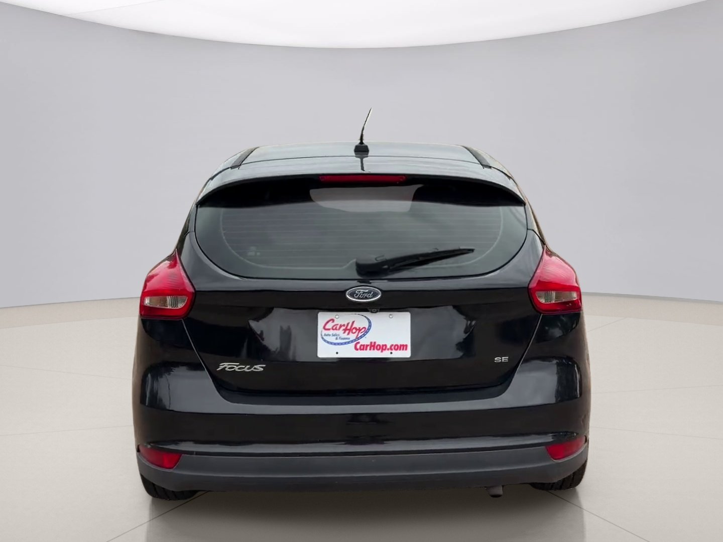 Used 2016 Black Ford SE HATCHBA image 4