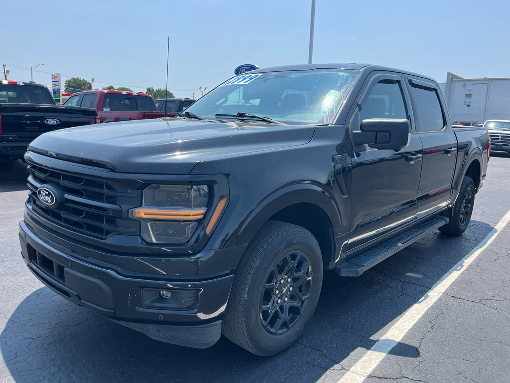 Used 2024 Agate Black Metallic Ford XLT image 1