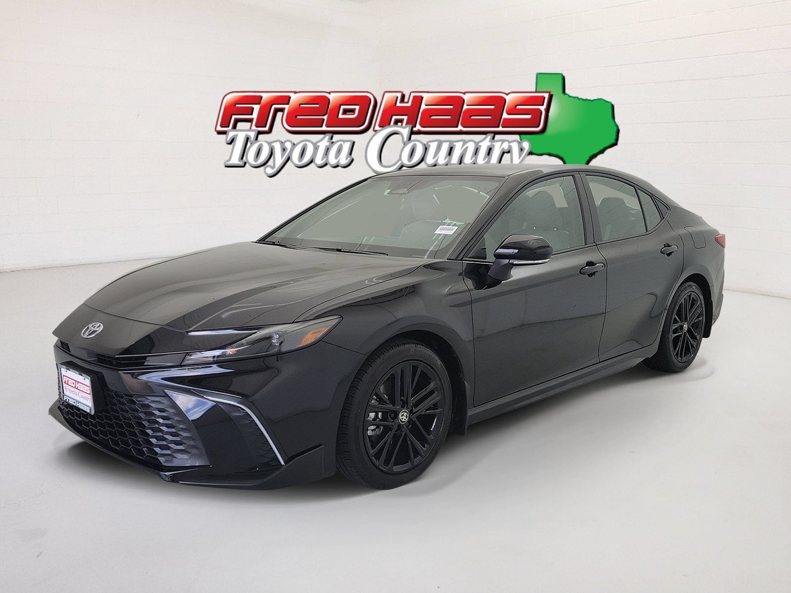 Used 2025 Midnight Black Metallic Toyota SE image 1