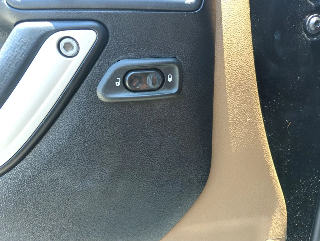 Used 2014 Black Jeep Unlimited Sahara image 19