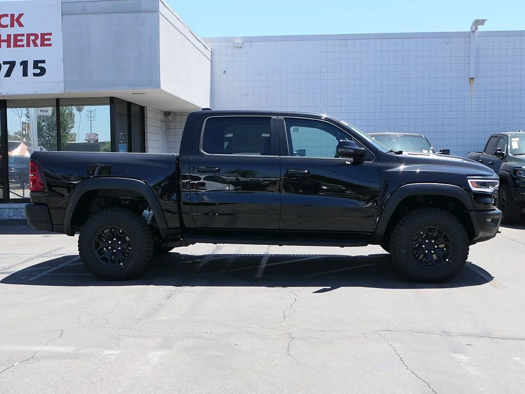 New 2026 Diamond Black Crystal Pearl Coat RAM RHO Crew Cab 4x4 5