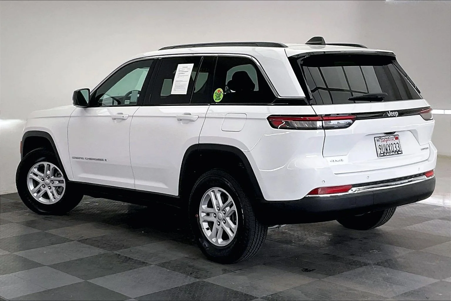 Used 2025 Bright White Clearcoat Jeep Laredo image 10