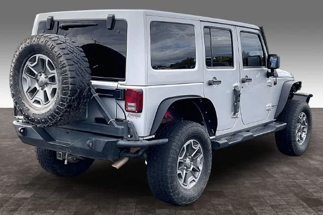 Used 2012 Jeep Wrangler Unlimited Sahara with VIN 1C4BJWEG4CL267451 for sale in Farmington, NM