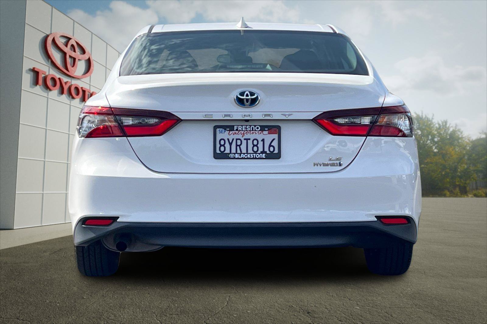 Certified Used 2021 Super White Toyota Hybrid LE image 4