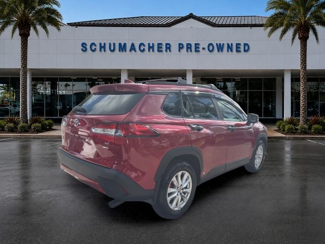 Used 2024 Barcelona Red Metallic Toyota LE image 7