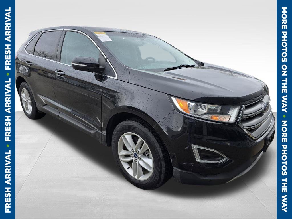 Used 2016 Black Ford SEL image 1