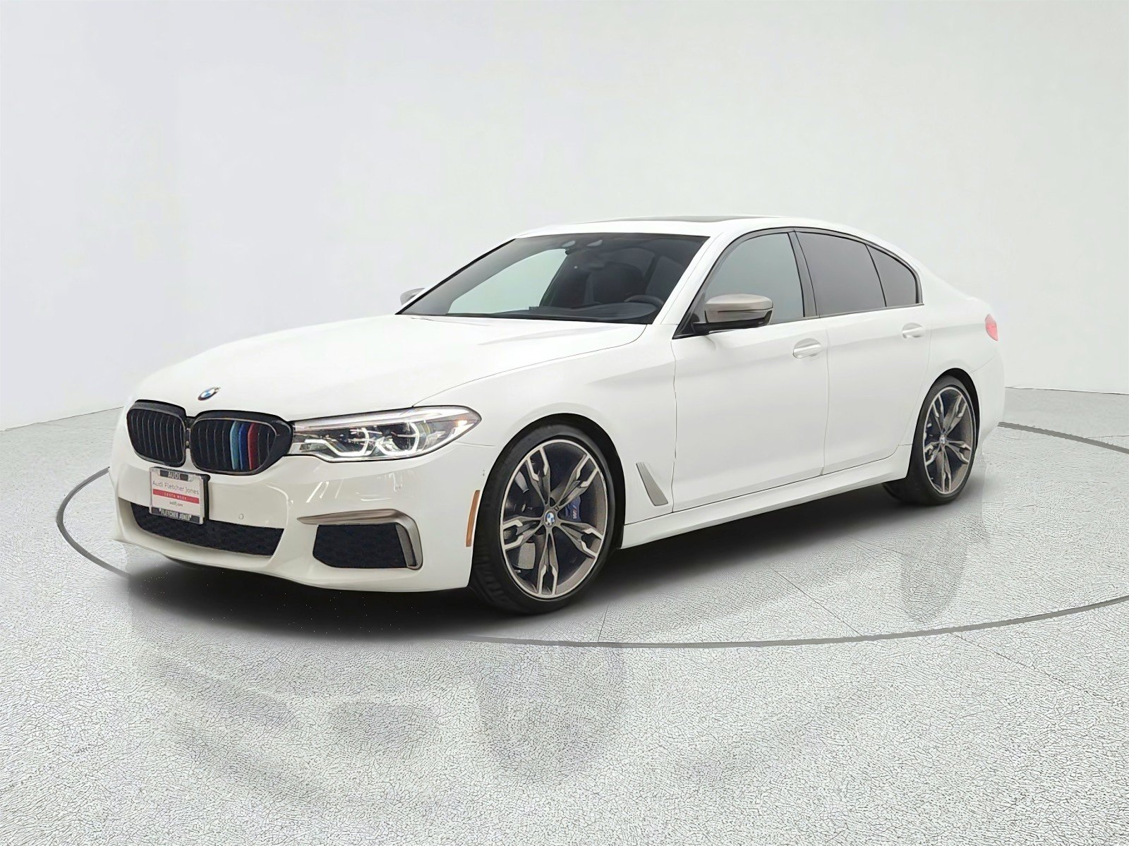 Used 2019 Alpine White BMW M550i xDrive Sedan image 1