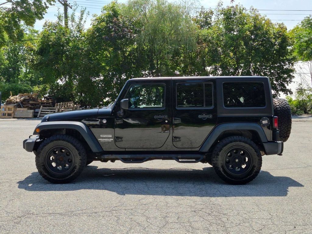 Used 2016 Black Jeep Unlimited Sport image 8