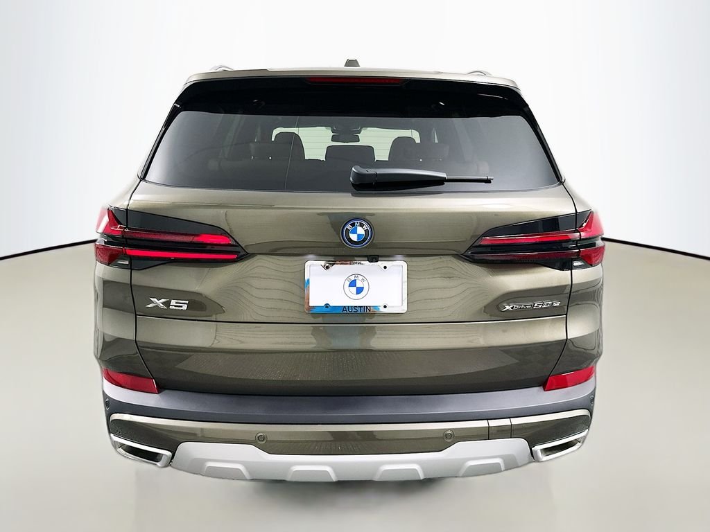 Used 2026 Manhattan Green Metallic BMW xDrive50e image 6