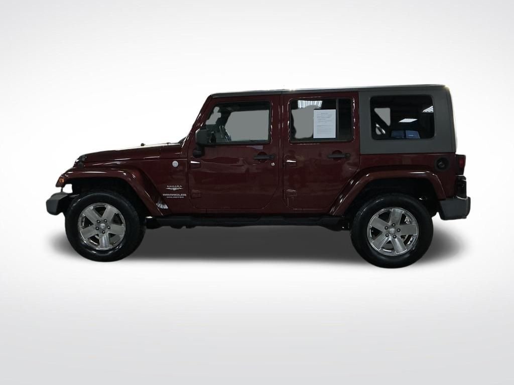 Used 2010  Jeep Unlimited Sahara image 2