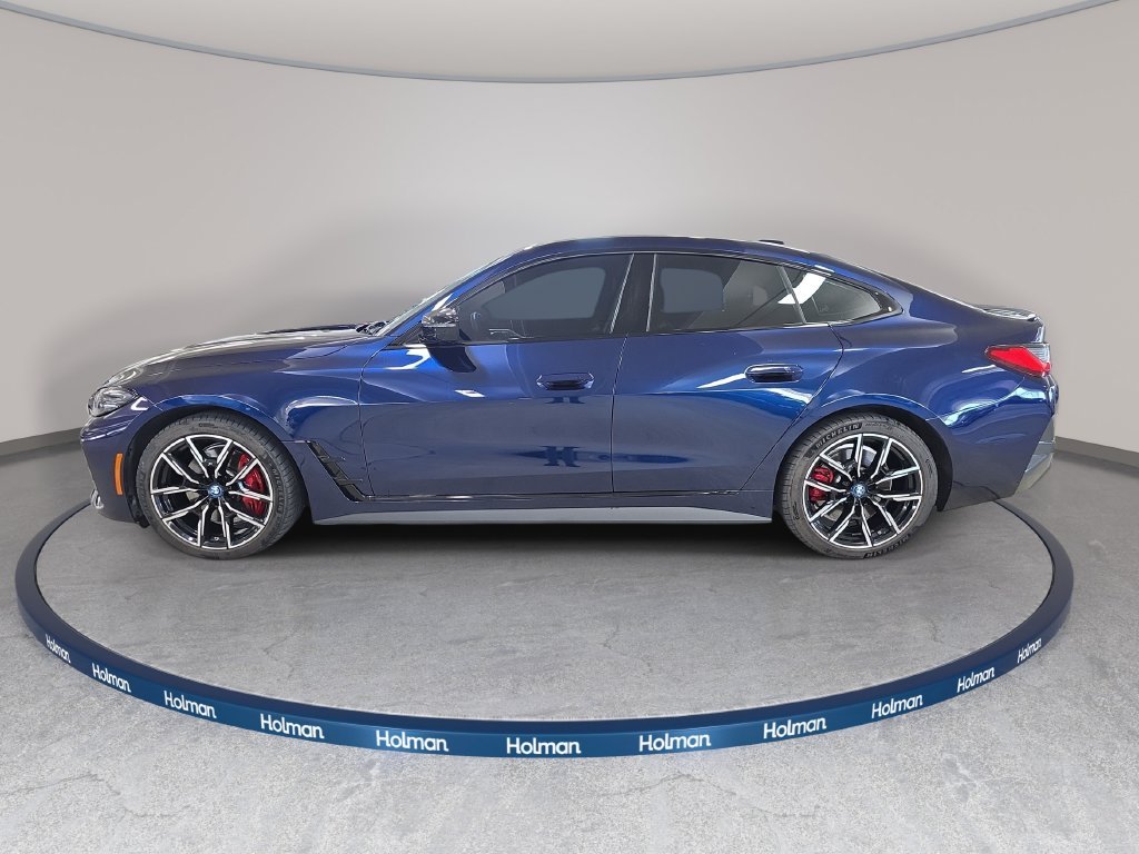 Used 2023 Tanzanite Blue II Metallic BMW eDrive40 image 11