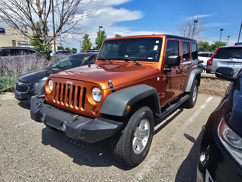 Used 2011 Mango Tango Pearlcoat Jeep Sport image 11
