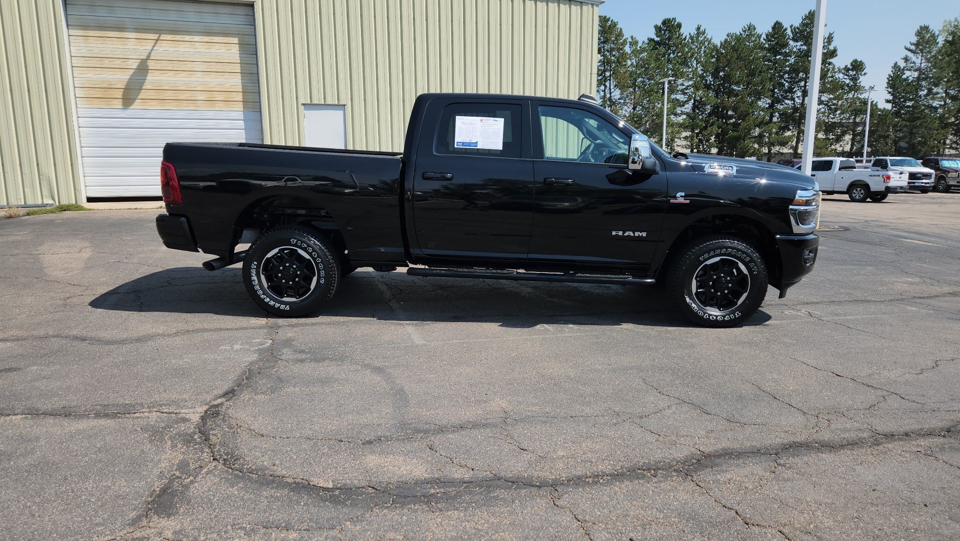 Used 2025 Diamond Black Crystal Pearlcoat Ram Laramie image 11