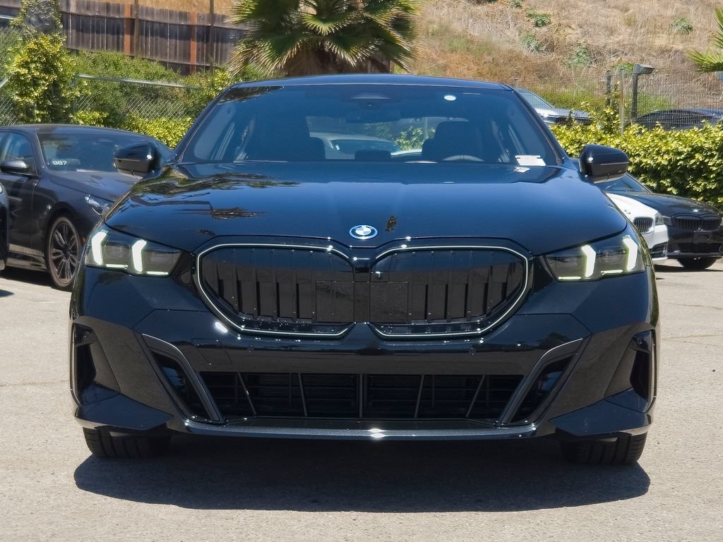 New 2027 Black Sapphire Metallic BMW 550e xDrive image 3