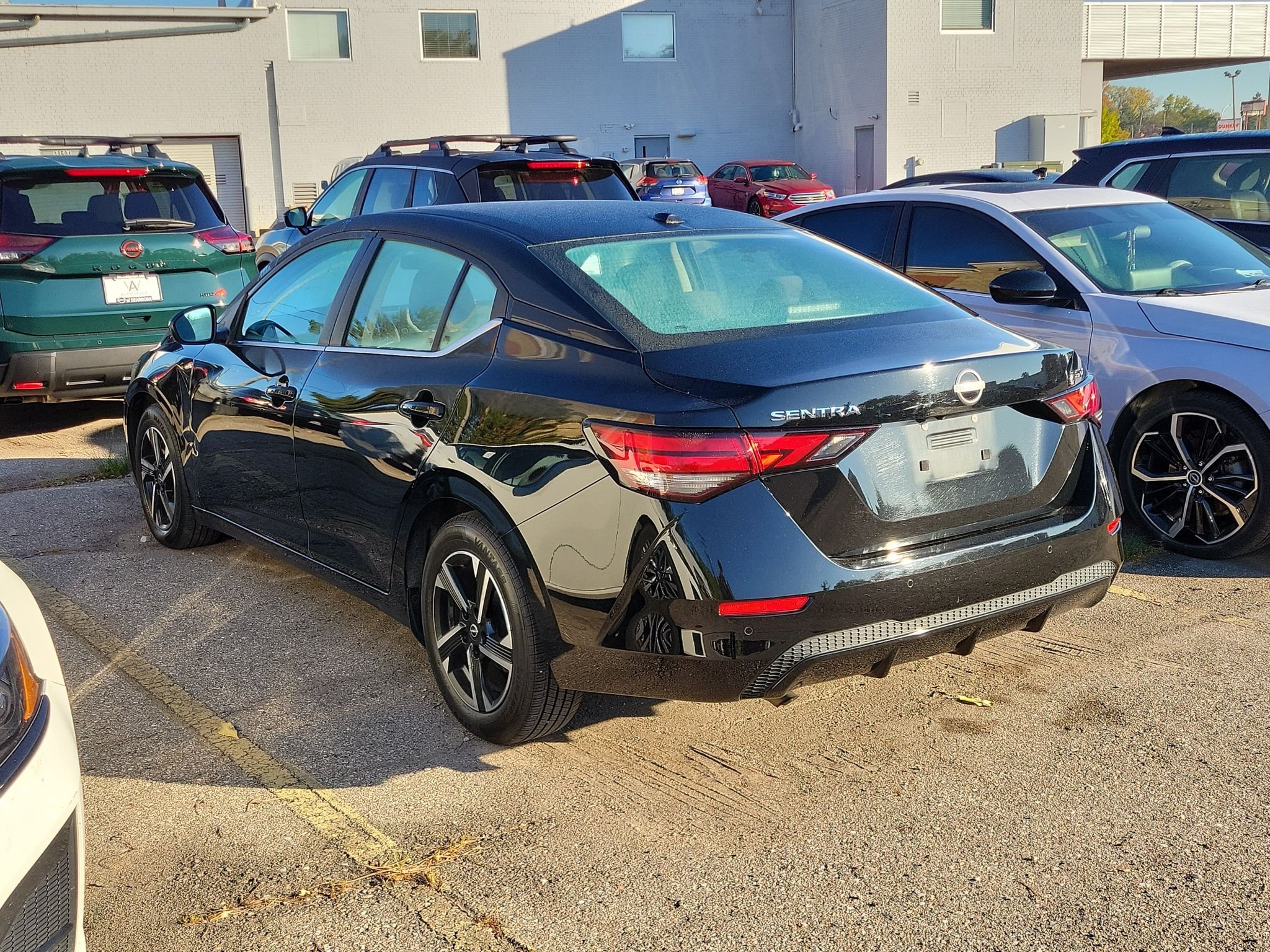 Used 2024 Super Black Nissan SV image 3