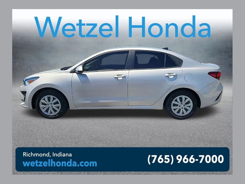 Used 2023 Silver Kia LX image 1