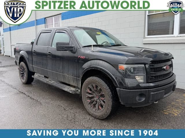 Used 2013 Black Ford FX4 image 1