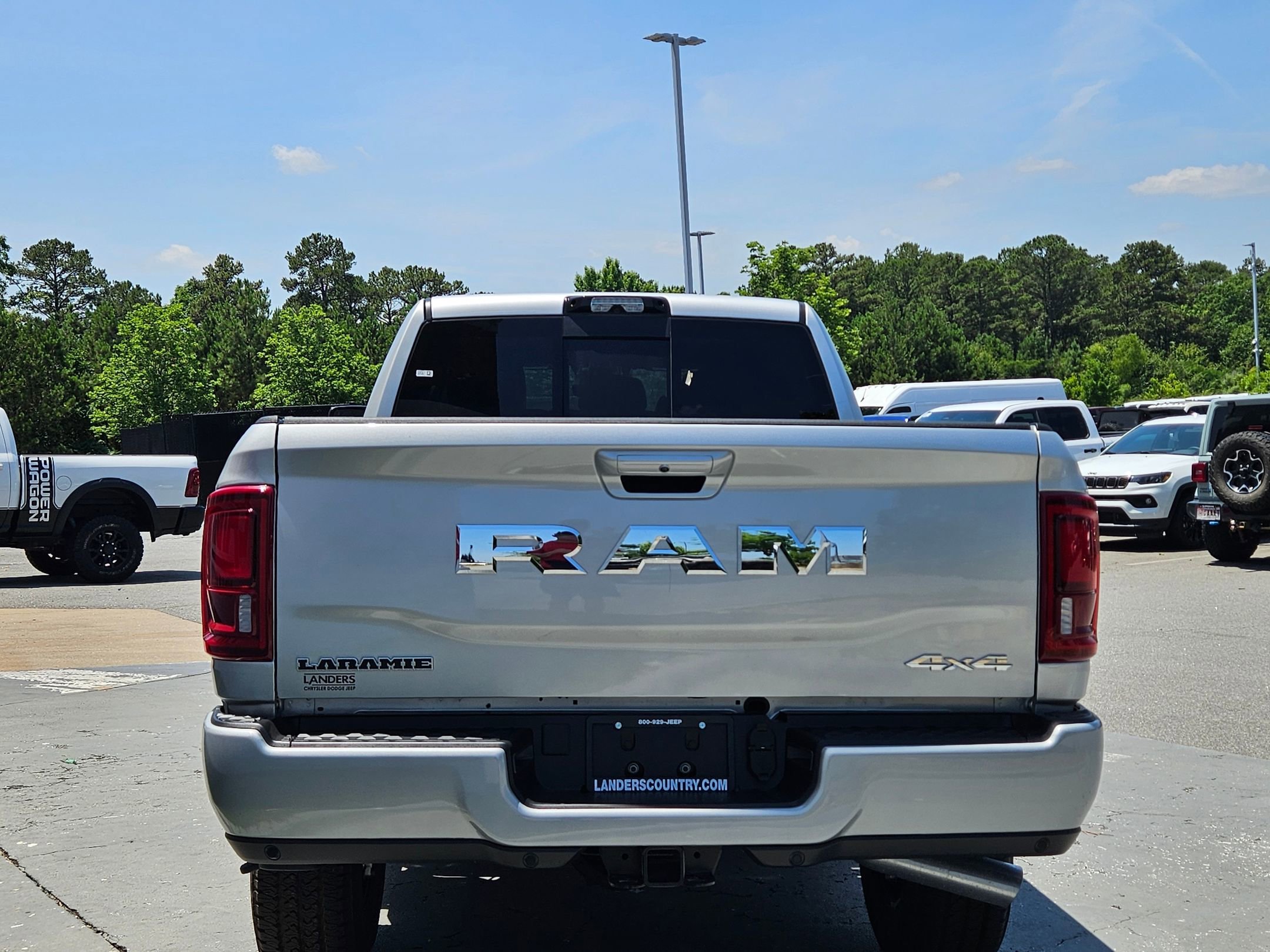 New 2026 Silver-Zynith Exterior Paint RAM Laramie image 6