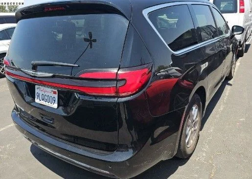 Used 2024 Black Chrysler Touring L image 2