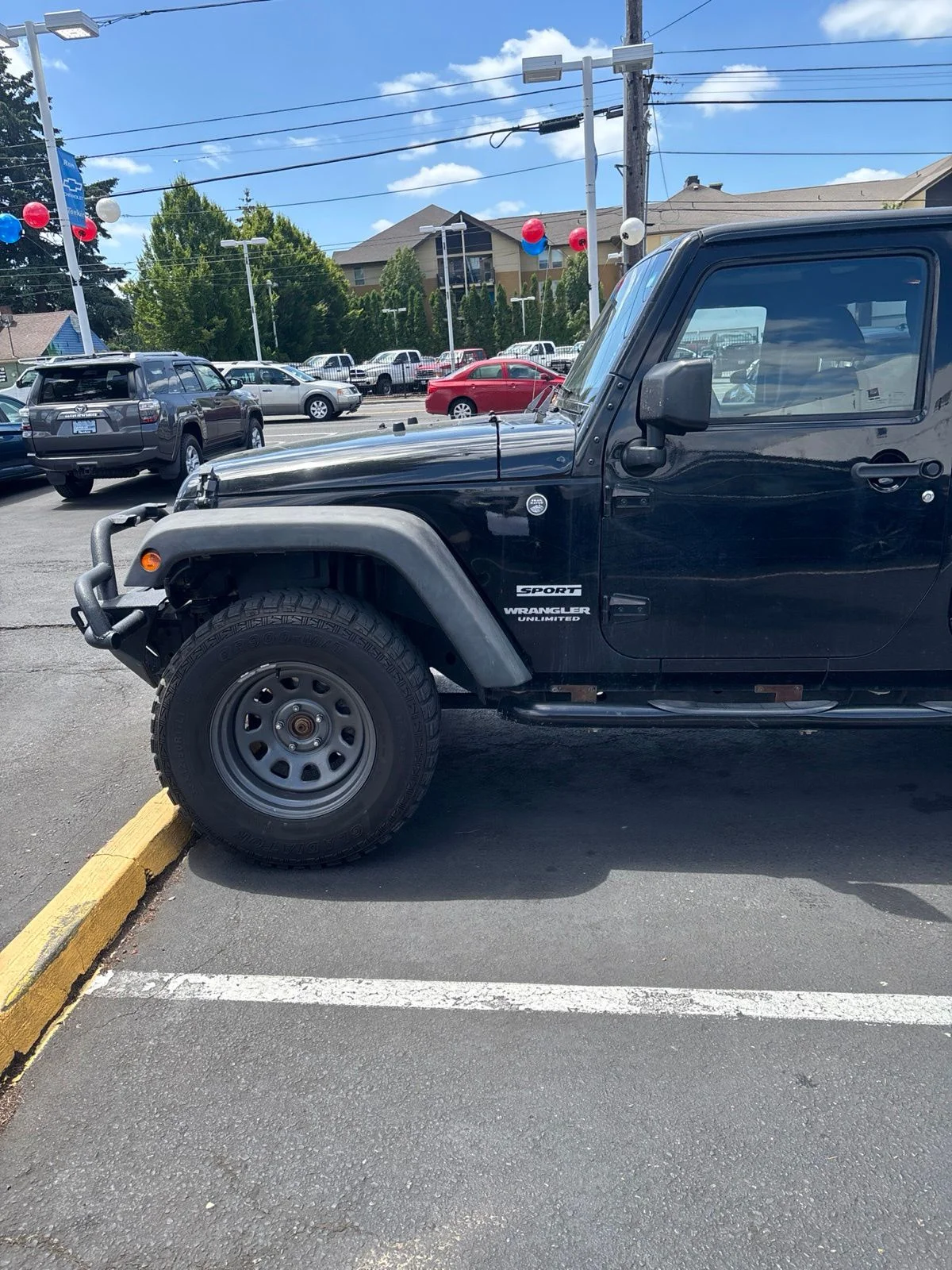 Used 2017 Black Clearcoat Jeep Unlimited Sport image 4