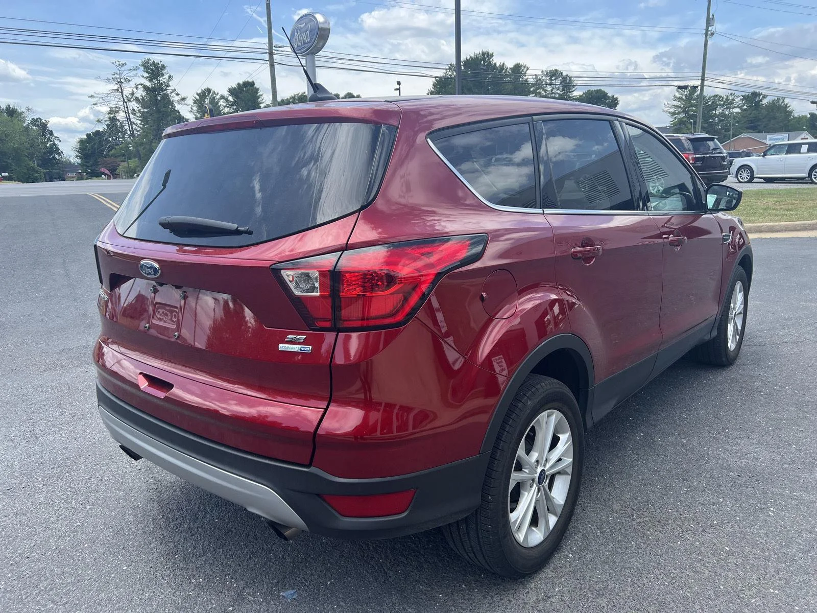 Used 2019 Ruby Red Metallic Tinted Clearcoat FORD SE 4WD image 5