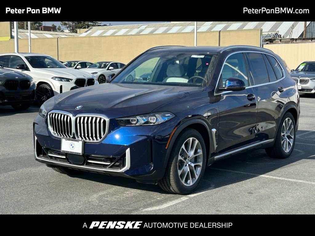 New 2026 Tanzanite Blue II Metallic BMW xDrive50e image 1