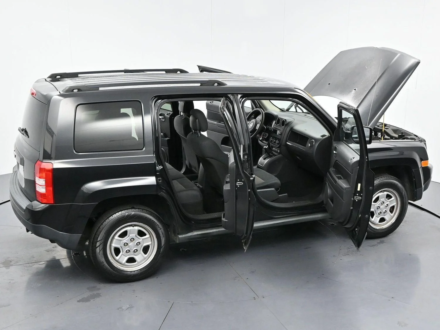 Used 2011 Brilliant Black Crystal Pearl Jeep Sport image 31