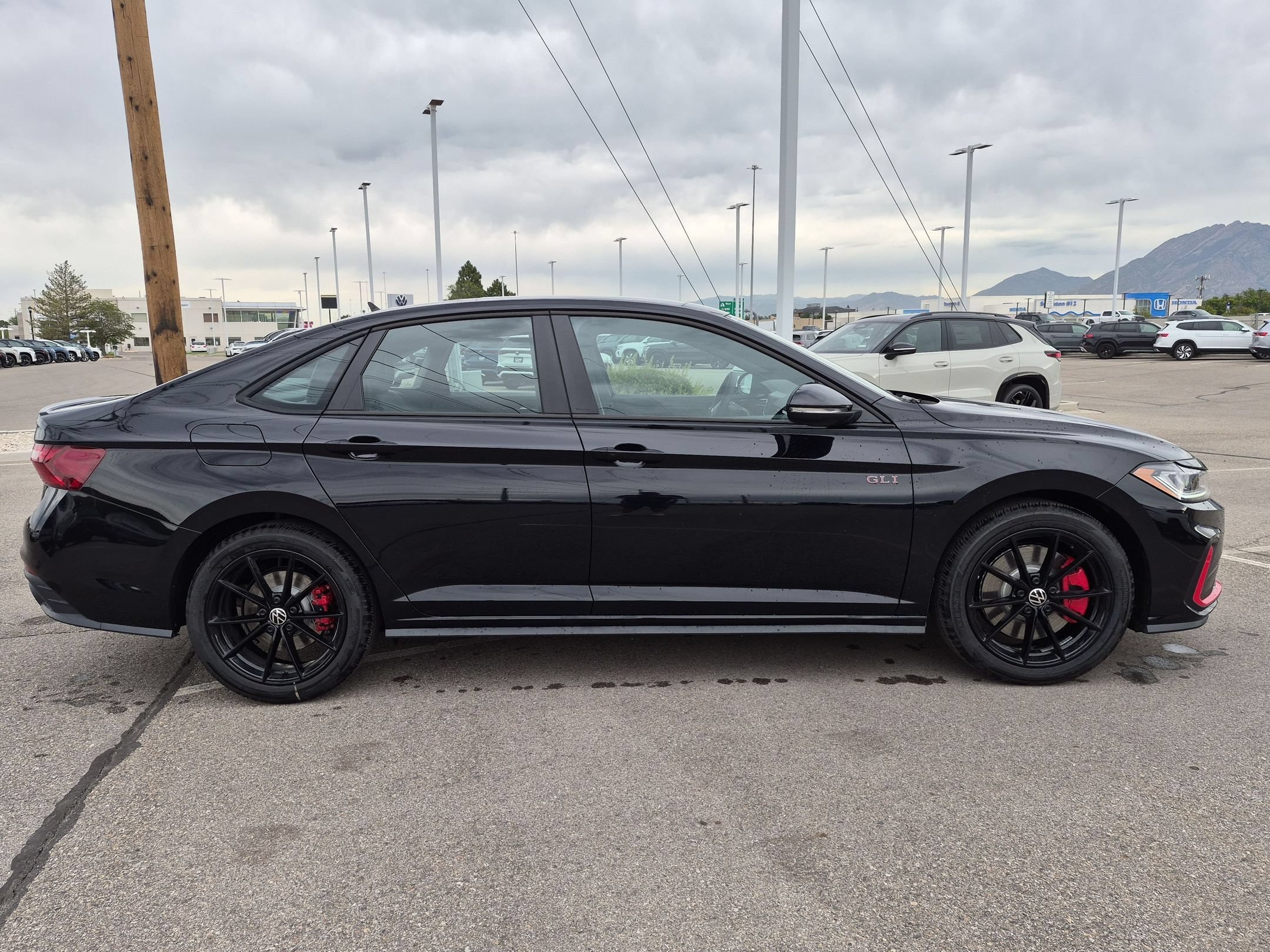 New 2026 Deep Black Pearl Volkswagen Autobahn image 2