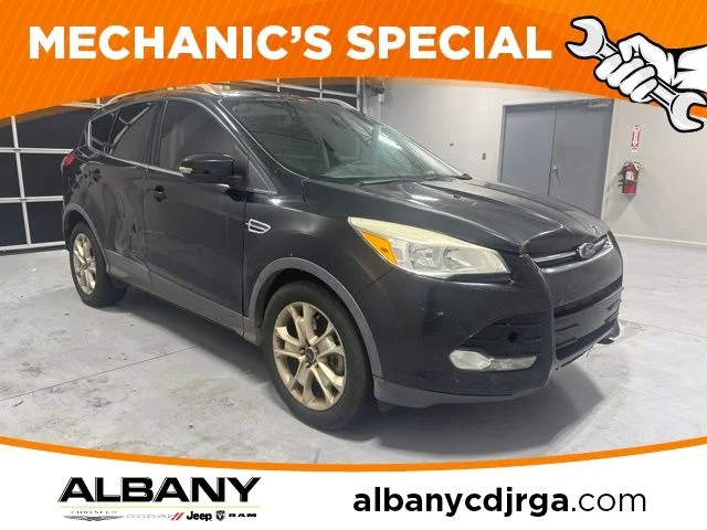 Used 2015 Black Ford Titanium image 1