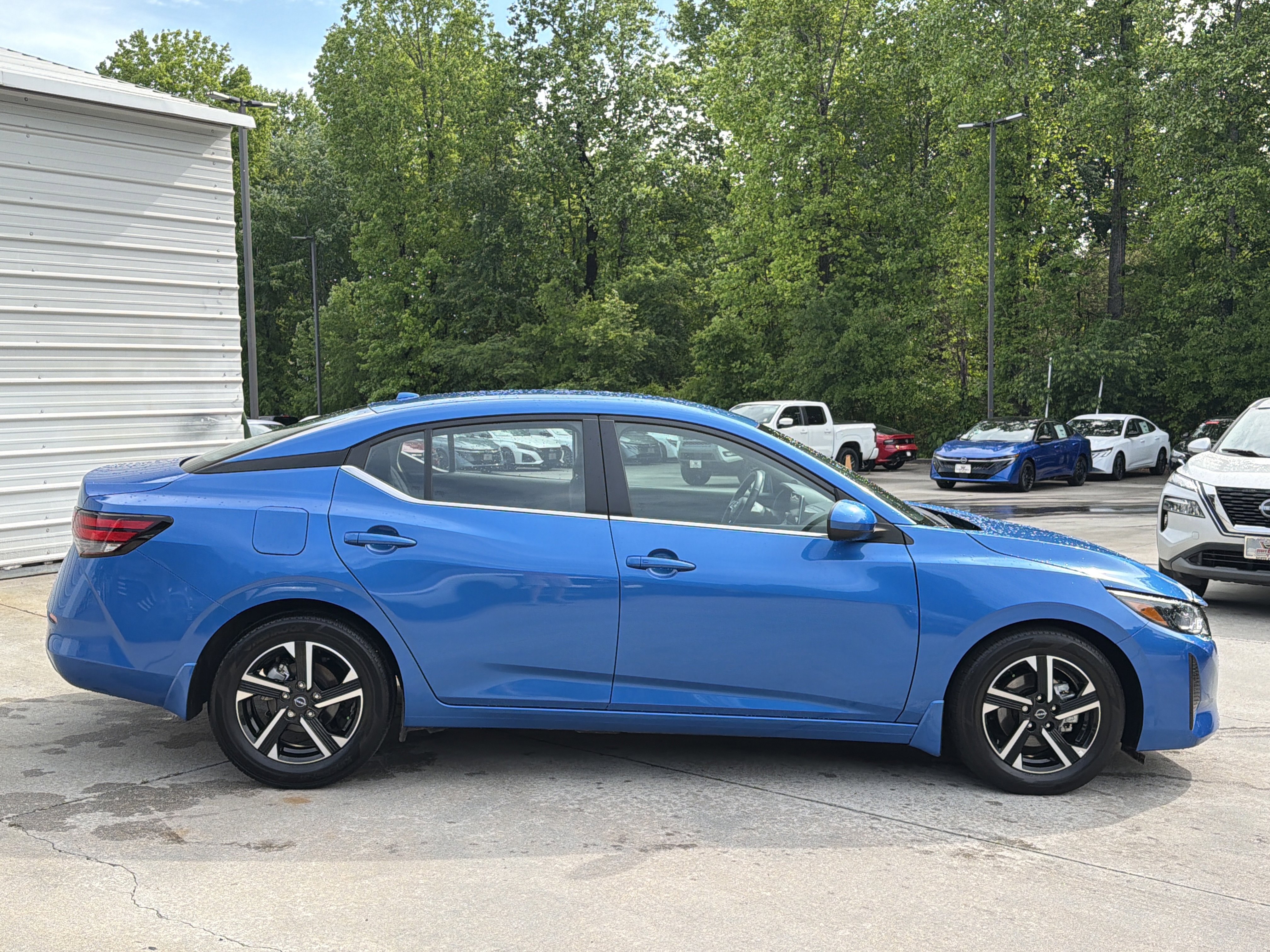 Used 2025 Electric Blue Metallic Nissan SV image 9