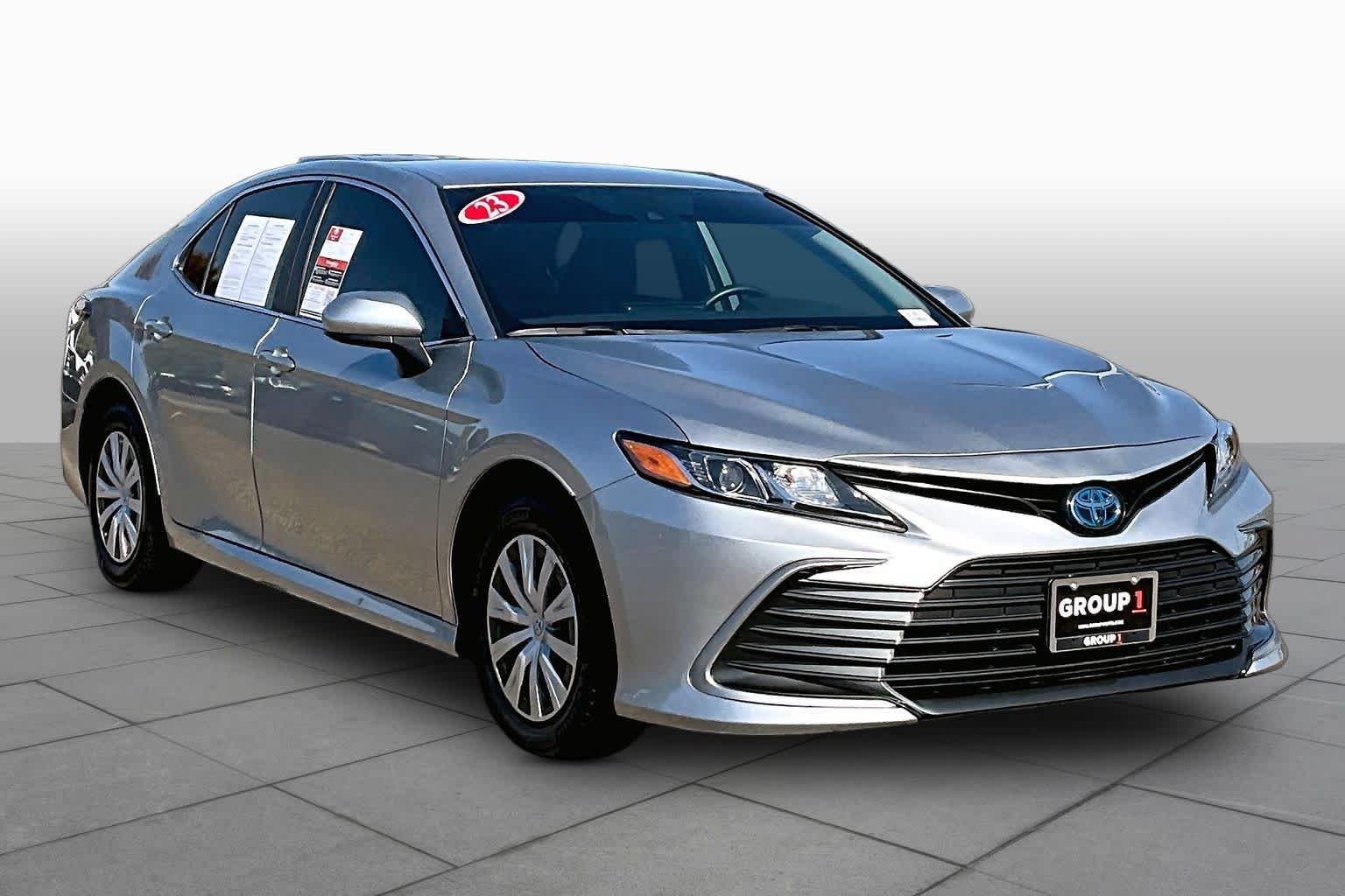 Used 2023 Celestial Silver Metallic Toyota Hybrid LE image 2