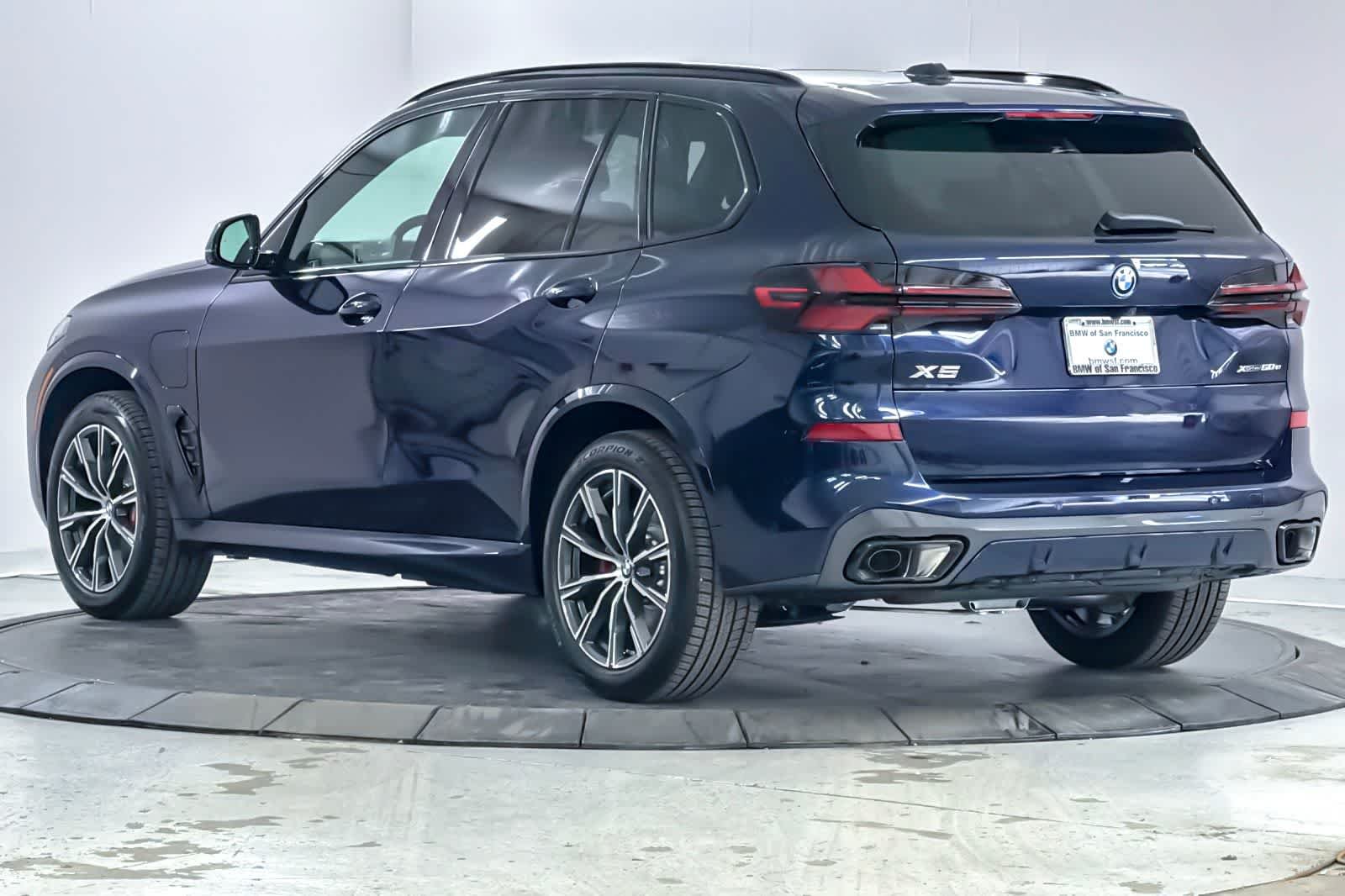 New 2026 Tanzanite Blue II Metallic BMW xDrive50e image 6