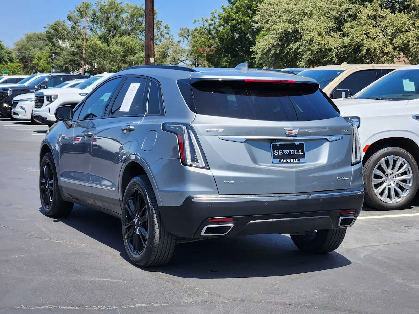 Used 2023 ARGENT SILVER METALLIC Cadillac AWD Sport image 5