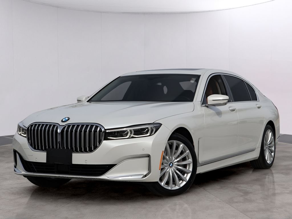 Used 2021 Mineral White Metallic BMW 740i xDrive image 1