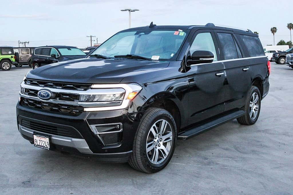 Used 2024 Black Metallic Ford Limited image 4