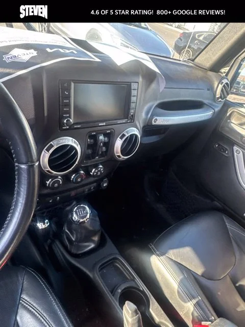 Used 2017 Black Jeep Unlimited Sahara image 11