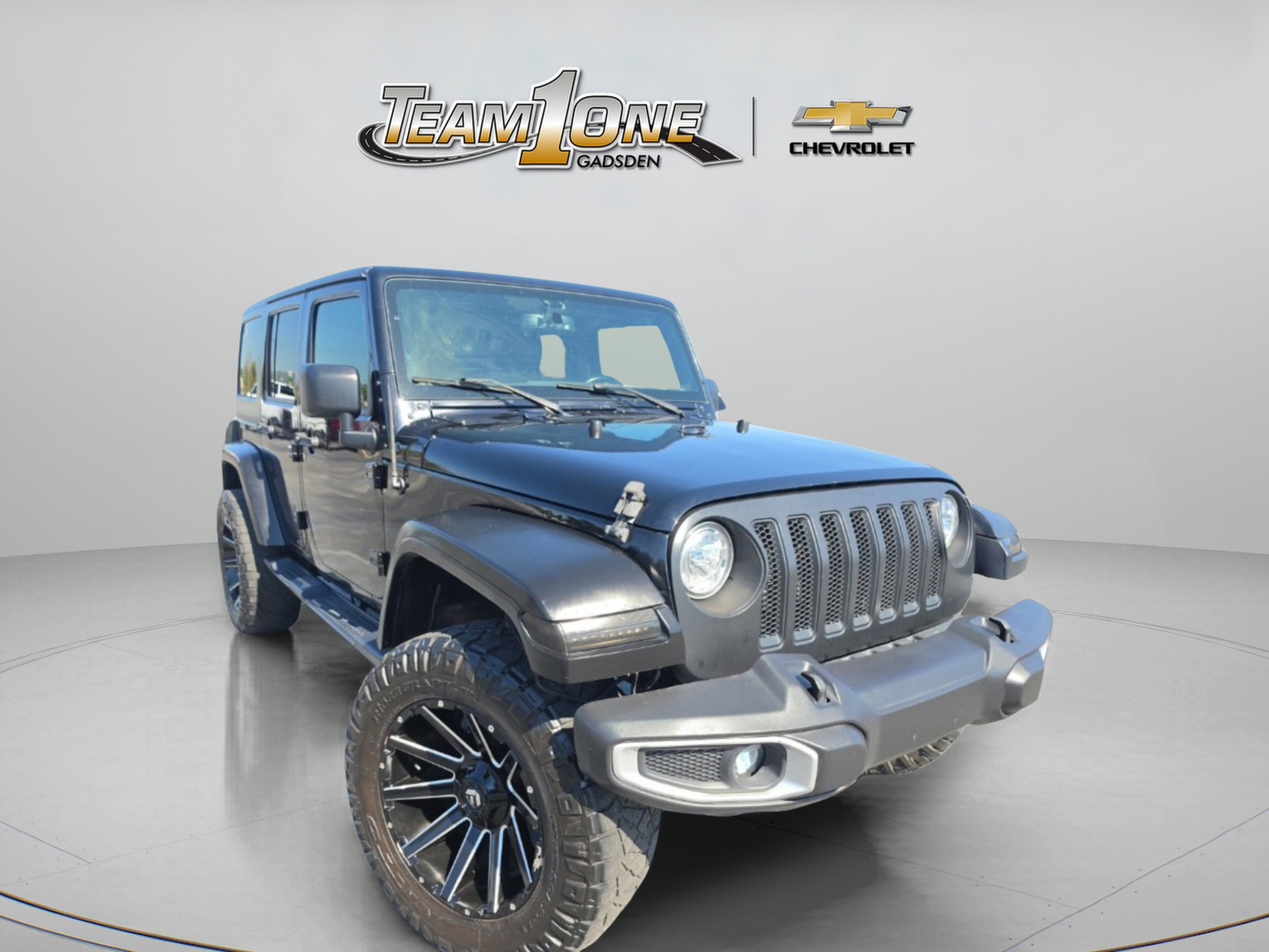 Used 2018 Black Clearcoat Jeep Unlimited Sahara image 1