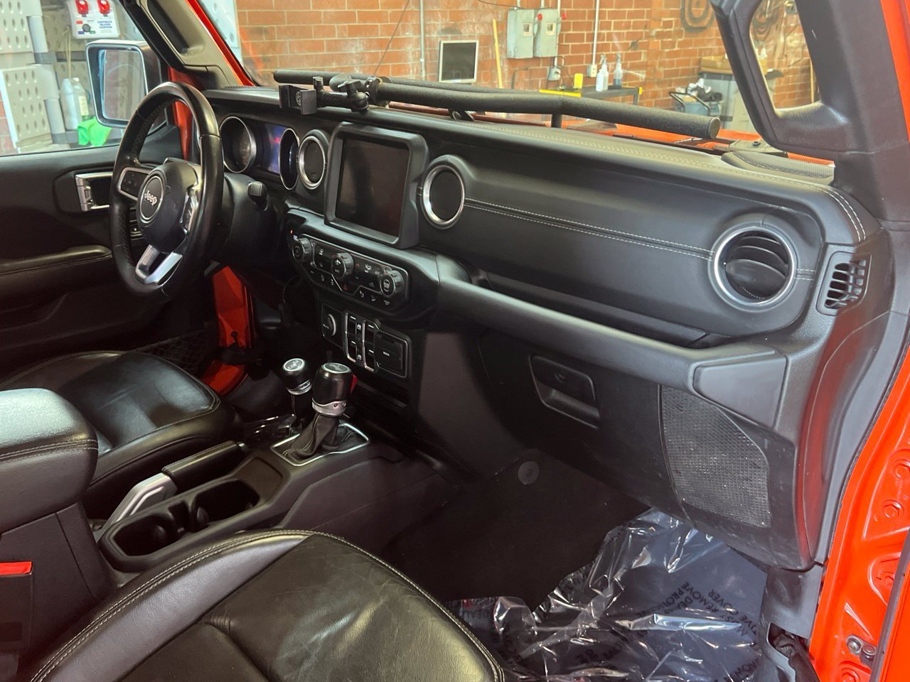 Used 2020 Orange Jeep Unlimited Sahara image 19